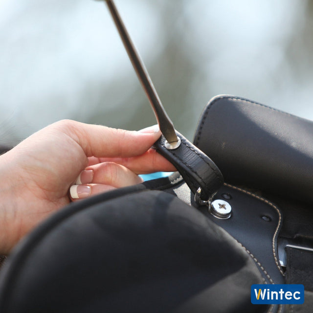 Screwing the Wintec Steady Grip onto the saddle